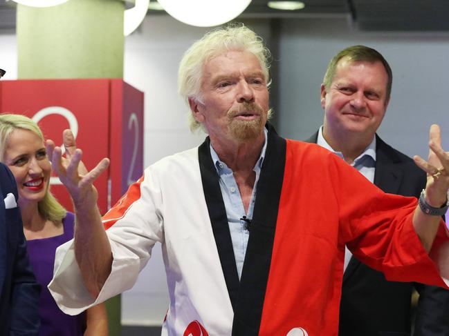 Minister for Innovation and Tourism Industry Development Kate Jones, Sir Richard Branson, and Brisbane Airport CEO Gert-Jan de Graaff, Virgin Australia promotes their new route from Brisbane to Japan, Brisbane Airport. Photographer: Liam Kidston.