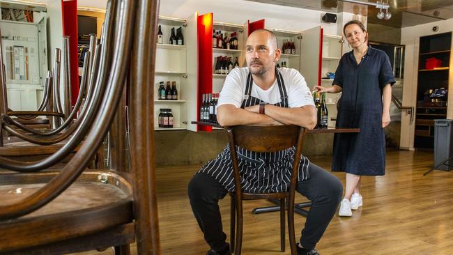 Shaun and Tanja Malone are emptying the wine and champagne stock as they close Bucci Restaurant and Bar in James Street, Fortitude Valley. Picture: AAP Image/Richard Walker