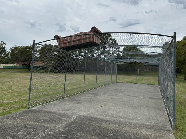 A couch dumped on top of a cage at Studio Village in Oxenford. Picture: Mark Boothman MP.