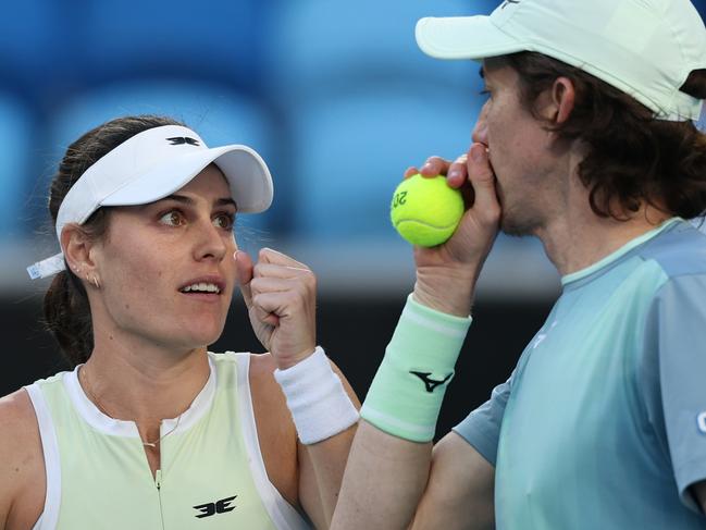 MELBOURNE, AUSTRALIA - JANUARY 22: Kimberly Birrell (L) and John-Patrick Smith (R) of Australia talk in the Mixed Doubles Semifinal against Olivia Nicholls and Henry Patten of Great Britain during day 11 of the 2025 Australian Open at Melbourne Park on January 22, 2025 in Melbourne, Australia. (Photo by Cameron Spencer/Getty Images)