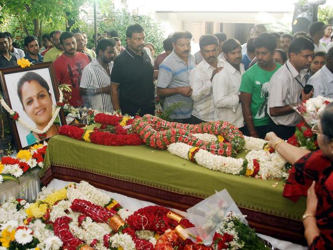 Relatives, friends, colleagues and public paying homage to the body of Prabha Arun Kumar in India.