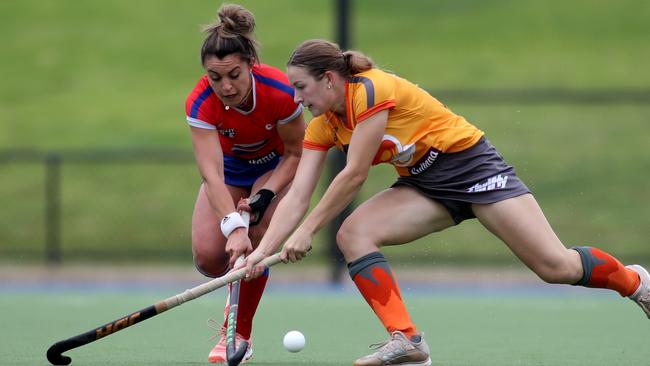 Australia and Adelaide Hockey Club star Michaela Spano (left) playing for the Fire in 2019. She will be a strong chance to take to the Hockey One field in 2022. Picture: Kelly Barnes