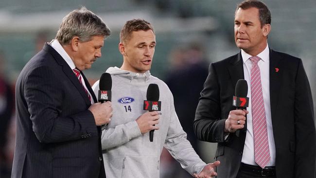 Joel Selwood speaks to television commentators Brian Taylor and Wayne Carey. Picture: Michael Dodge