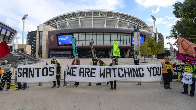 A banner says “Santos we are watching you”. Picture: NCA NewsWire / RoyVphotography