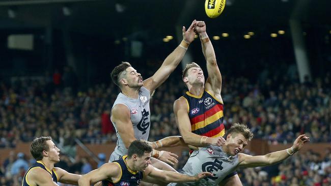 Adelaide’s Daniel Talia, right, and Carlton’s Levi Casboult, left, contest the ball at Adelaide Oval. Picture: Sarah Reed                        Crows press conference