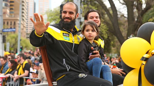 Bachar Houli with his daughter, Sarah, during the AFL Grand Final Parade.