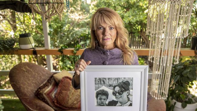 Sonia Anderson holds an image of her daughter Bianca Girven, who was murdered nine years ago. Picture: Glenn Hunt