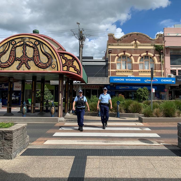 Richmond Police District officers patrolling a quiet Lismore CBD during COVID-19 lockdown.