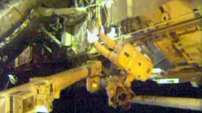 Astronauts on spacewalk to fix station