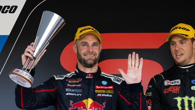 Shane van Gisbergen celebrates on the podium during race three of the Townsville SuperSprint earlier this month.