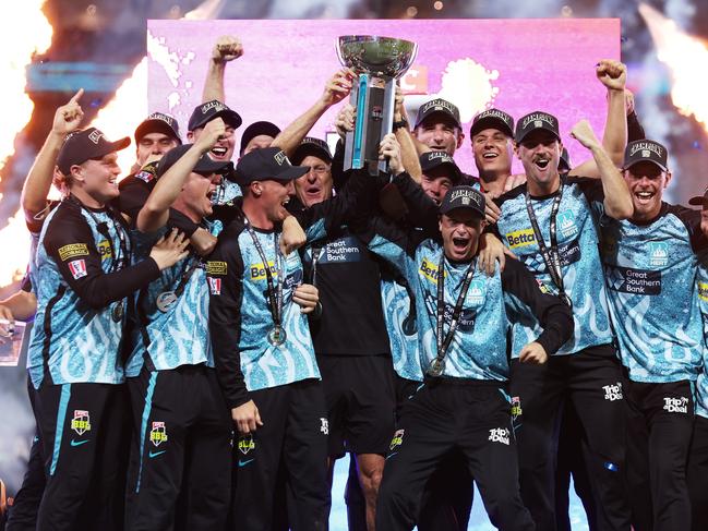 SYDNEY, AUSTRALIA - JANUARY 24:  Brisbane Heat hold aloft the BBL trophy and celebrate victory during the BBL Final match between Sydney Sixers and Brisbane Heat at Sydney Cricket Ground, on January 24, 2024, in Sydney, Australia. (Photo by Matt King/Getty Images)