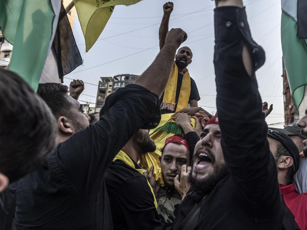 Hezbollah supporters carry the coffin of a militant killed by the Israeli Defence Force in southern Lebanon. Picture: Getty