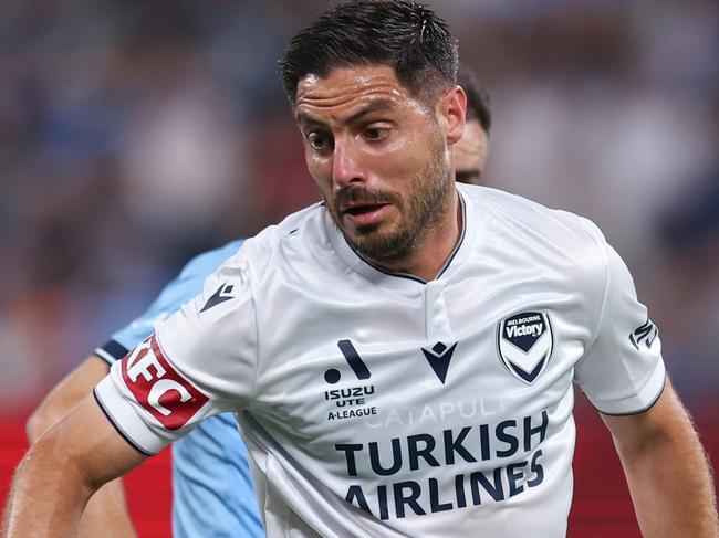 SYDNEY, AUSTRALIA - DECEMBER 28: Bruno Fornaroli of the Victory competes with Anthony Caceres of Sydney during the round 10 A-League Men match between Sydney FC and Melbourne Victory at Allianz Stadium, on December 28, 2024, in Sydney, Australia. (Photo by Brendon Thorne/Getty Images)