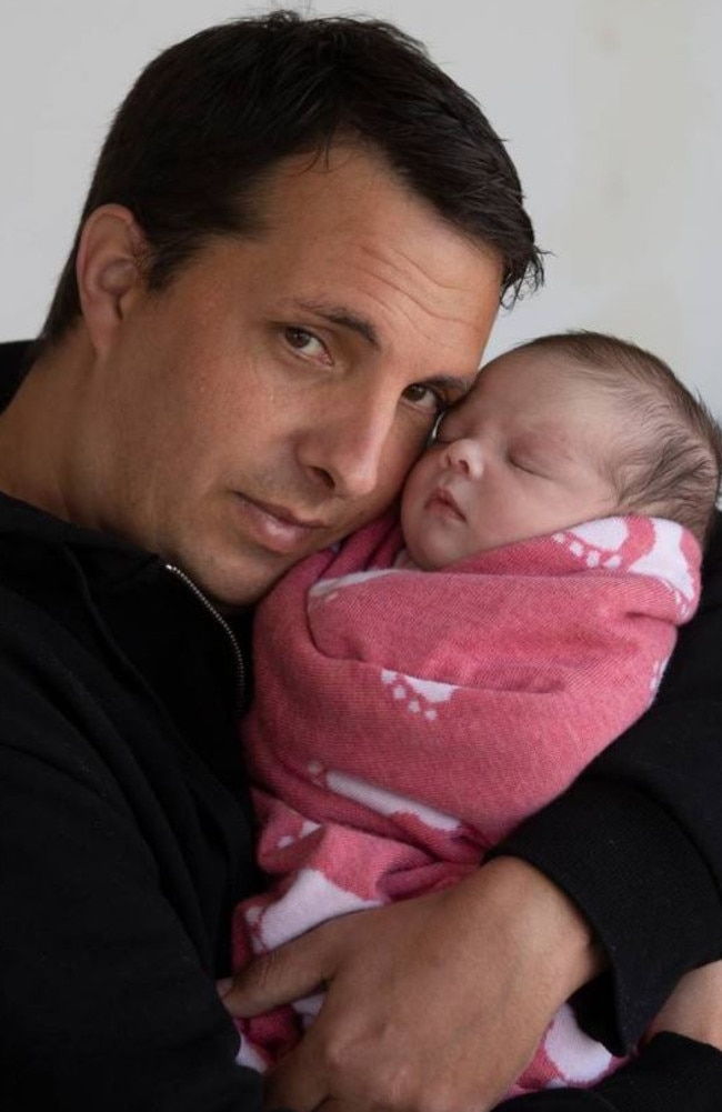 Kirk Ross and three-week-old daughter Kora Cockburn-Ross. Fiancee Shelly Cockburn died while giving birth to the couple's daughter at Tauranga Hospital. Picture: Alan Gibson