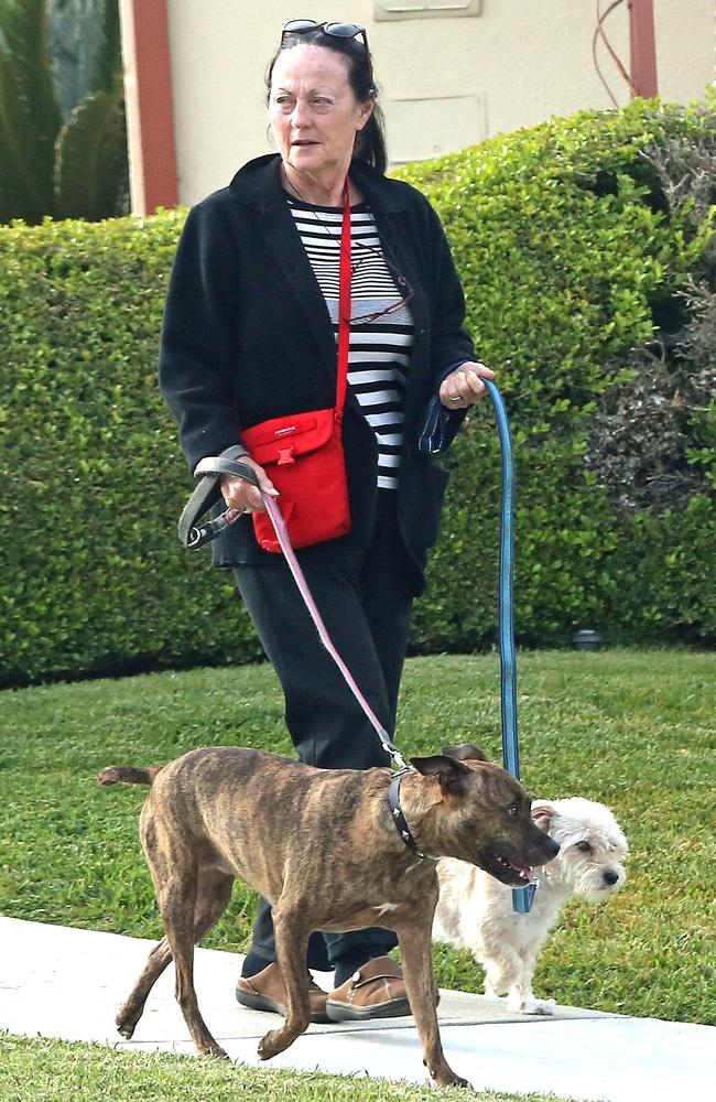 A dogwalker was pictured with Doria’s two dogs on her usual route near her Los Angeles home. Picture: P&amp;P/MEGA