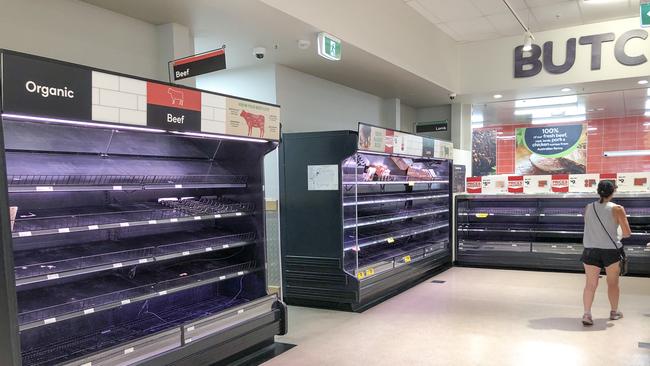 Many supermarkets have had shelves stripped of essential items such as meat, pasta, rice and toilet paper. Picture: Tim Marsden