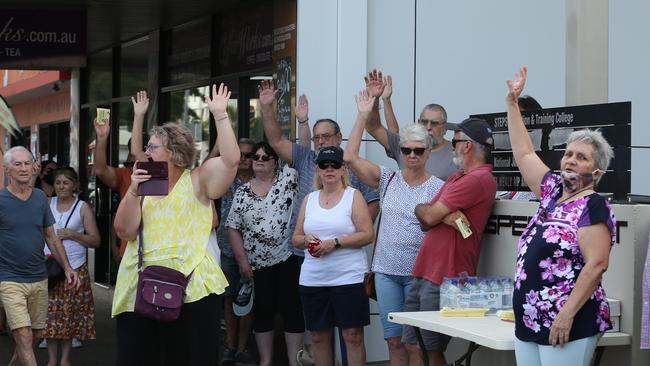 Around 40 concerned Cairns residents attended at Crime & Justice Action Group organised rally outside Member for Cairns Michael Healy's office on Spence Street. Picture: Brendan Radke