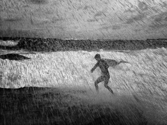 Winner: Clare Bardsley-Smith's 'Boy vs Wild': Taken during a large storm at Coogee Beach. The boys were fearless, braving the huge waves and diving off one of the large rocks into the surrounding rock pool'. Head On Head On Photo Festival Mobile Prize 2014