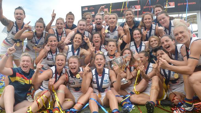 GOLD COAST, AUSTRALIA — March 25: The Crows celebrate victory during the 2017 AFL Womens Grand Final match between the Brisbane Lions and the Adelaide Crows on 25th March 2017 at Metricon Stadium on the Gold Coast, Australia. (Photo by Bradley Kanaris/News Corp )