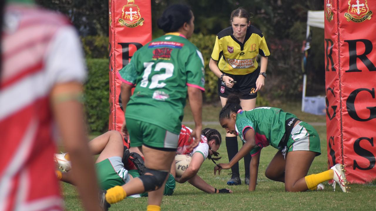 Emu Park's Sarah Field is cut down just short of the tryline in the A-grade women's qualifying semi-final against Fitzroy/Gracemere. Photo: Pam McKay