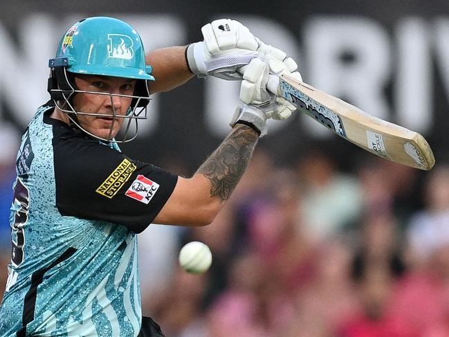 Brisbane Heats' Josh Brown plays a shot during the BBL final match between Sydney Sixers and Brisbane Heat at Sydney Cricket Ground on January 24, 2024. (Photo by Izhar KHAN / AFP) / -- IMAGE RESTRICTED TO EDITORIAL USE - STRICTLY NO COMMERCIAL USE --