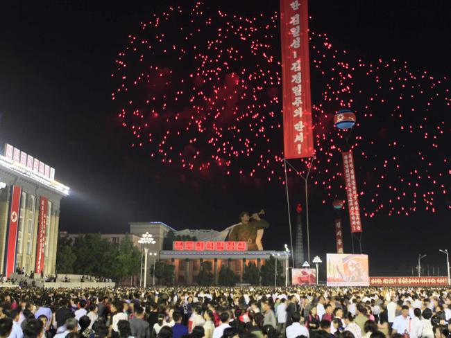 North Koreans celebrate the test of its hydrogen bomb in Kim Il-sung Square last week. Picture: Jon Chol-jin/AP