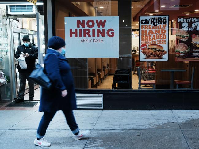 NEW YORK, NEW YORK - NOVEMBER 05: A person walks by a sign advertising employment at a fast-food restaurant on November 05, 2021 in New York City. Markets were higher in morning trading as new Labor Department numbers showed that nonfarm payrolls increased by 531,000 for the month of October, above expectations. The jobless rate is expected to edge down to 4.7%.   Spencer Platt/Getty Images/AFP == FOR NEWSPAPERS, INTERNET, TELCOS & TELEVISION USE ONLY ==