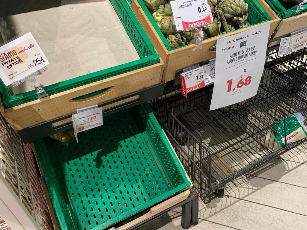 A picture shows empty shelves in a supermarket in central Milan. Picture: Miguel Medina/AFP.