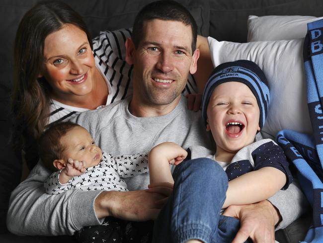 GROUNDED: Sturt coach Martin Mattner with wife Chelsea and sons baby Jimmy and Oscar, 3. <b>Picture: SARAH REED</b>