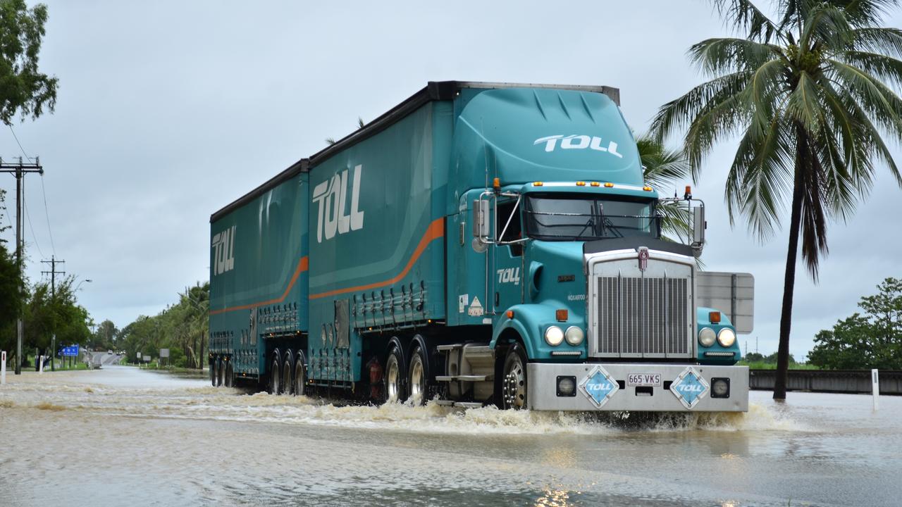 Heavy vehicles were allowed through earlier this morning with flood levels at Plantation Creek spilling across the Bruce Highway.