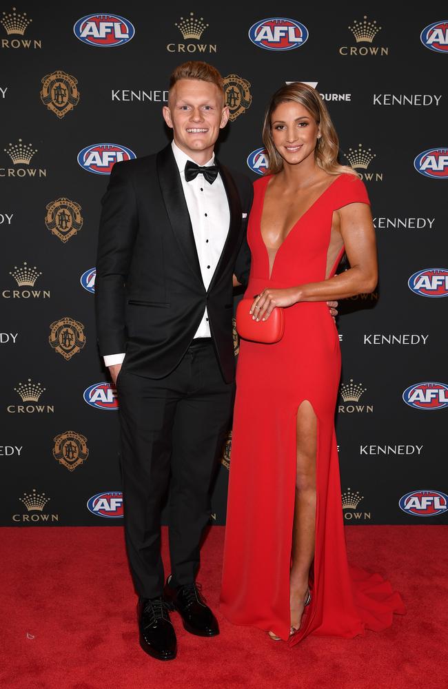 Adam Treloar and his partner, netball star Kim Ravaillion. Picture: Quinn Rooney/Getty Images