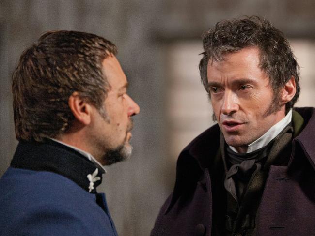 (L to R) Javert (RUSSELL CROWE) confronts Jean Valjean (HUGH JACKMAN) in Les Mis�rables, the motion-picture adaptation of the beloved global stage sensation seen by more than 60 million people in 42 countries and in 21 languages around the globe and still breaking box-office records everywhere in its 28th year.