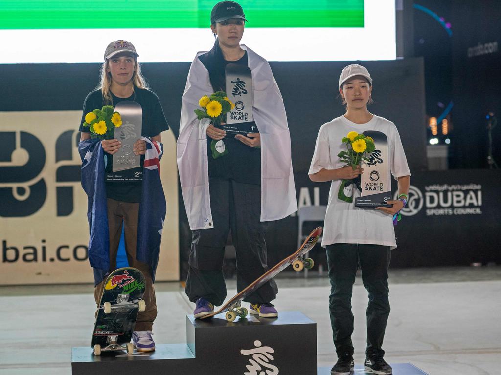 Winner Japan's Liz Akama, centre, narrowly beat Chloe in the Women's Street Finals at the World Skateboarding Tour (WST), in Dubai on March 10. Third place went to Japan's Coco Yoshizawa, pictured right. Picture: Ryan Lim/AFP