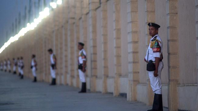 Members of the Egyptian police force stand guard outside the El-Mosheer Tantawy Mosque ahead of the memorial ceremony held by EgyptAir for relatives and family members. Picture: Getty