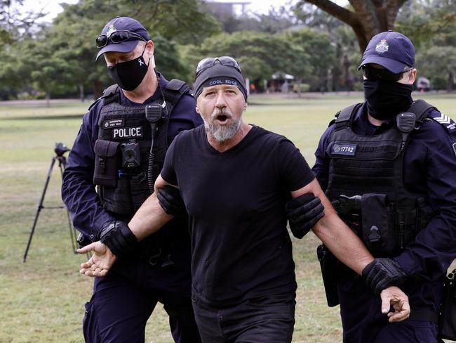 COVID Lockdown protester is arrested in New Farm Park. Picture: Liam Kidston