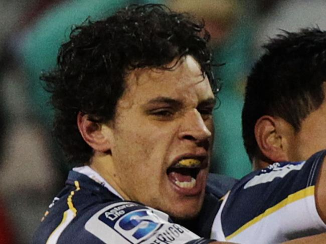 CANBERRA, AUSTRALIA - JULY 19: Brumbies players celebrate a try by Nic White during the Super Rugby Qualifying FInal match between the Brumbies and the Chiefs at GIO Stadium on July 19, 2014 in Canberra, Australia. (Photo by Stefan Postles/Getty Images)