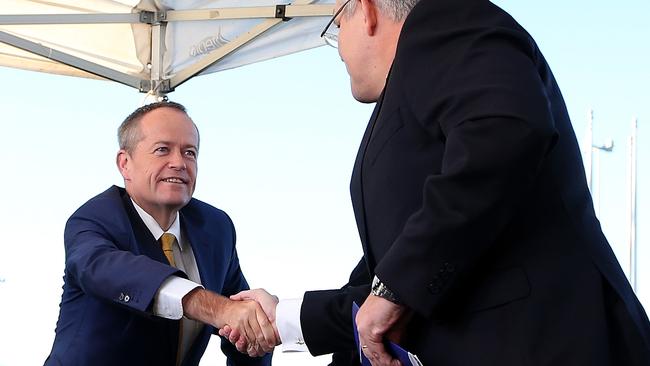 Bill Shorten and Scott Morrison shake hands outside Parliament House this morning. Picture: Kym Smith