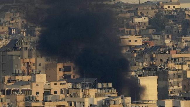 Smoke rise from Israeli airstrikes on Dahiyeh, Beirut's southern suburbs, Lebanon, Wednesday, Oct. 16, 2024. (AP Photo/Hussein Malla)