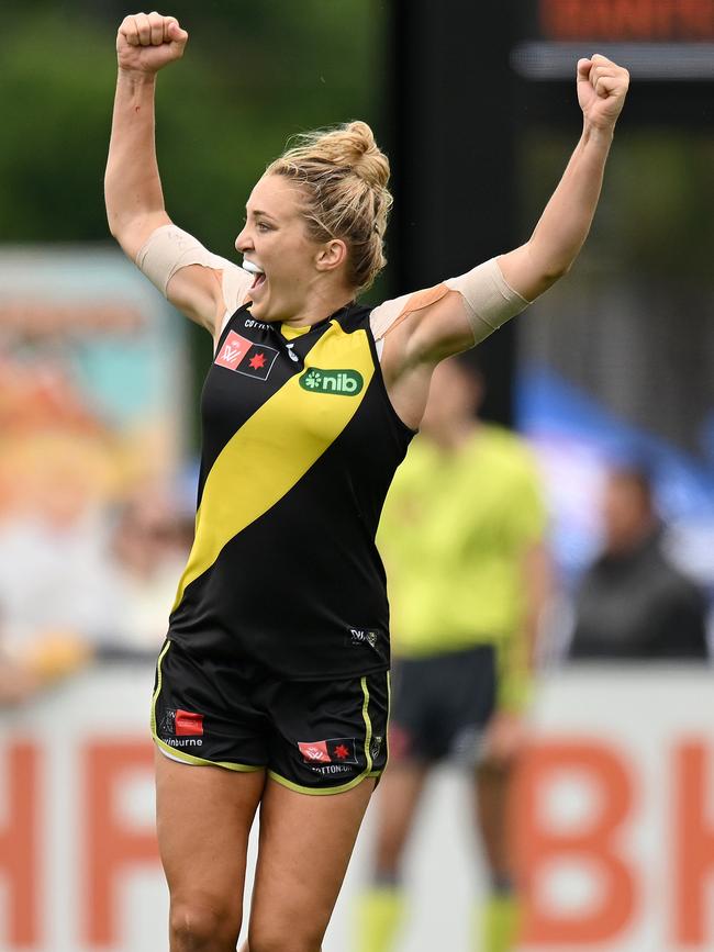 Jess Hosking rejoices after kicking a goal.