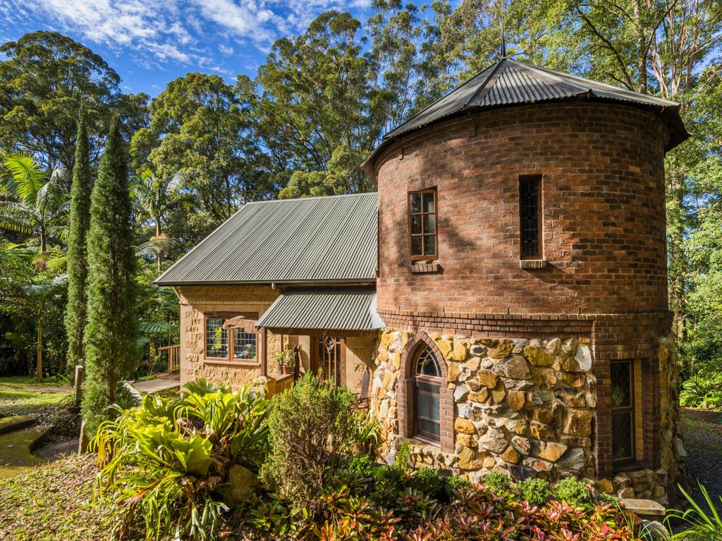 This medieval-style cottage in the Coffs Harbour region is up for sale.