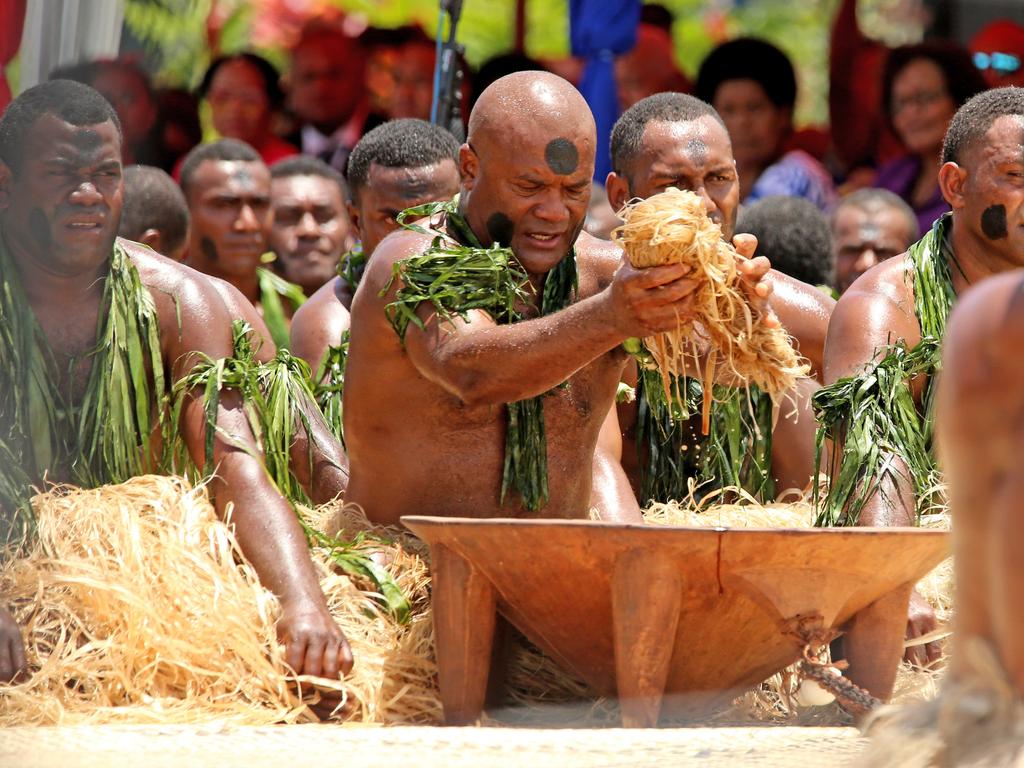 The Duke and Duchess of Sussex Prince Harry and Meghan take part in a traditional fijian ceremony at Nadi Airport in Fiji to . Picture: Nathan Edwards