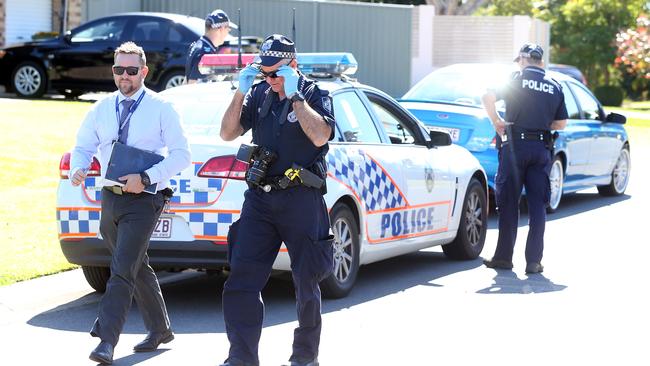 2015: Police in a nearby street looking over a car believed to be involved in the crime. Pic by Richard Gosling