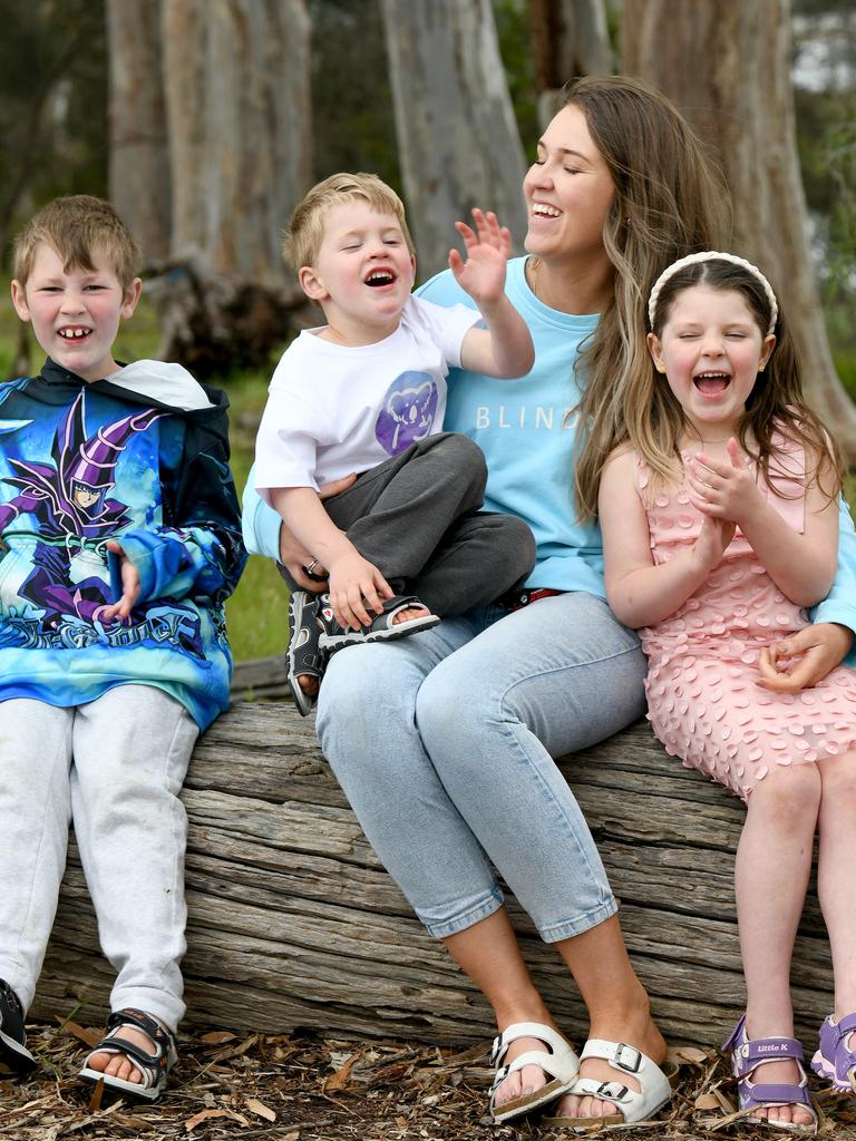 Hudson and Holly are each beginning to show symptoms of the progressive illness, but remain all-smiles thanks to endless amounts of love from their mum Renee. Picture: Naomi Jellicoe