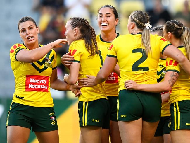 TOWNSVILLE, AUSTRALIA - OCTOBER 14: Tamika Upton of the Jillaroos celebrates with her team mates after scoring a try during the Womens Pacific Championship match between the Australia Jillaroos and New Zealand Kiwi Ferns at Queensland Country Bank Stadium on October 14, 2023 in Townsville, Australia. (Photo by Ian Hitchcock/Getty Images)