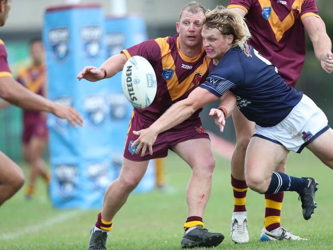 Riverina’s Kyle McCarthy and Newcastle’s Luke Huth. Picture: Sue Graham