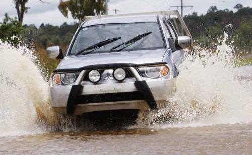 If it is flooded, forget it. No matter how big your four-wheel-drive is. And slow down! Picture: David Nielsen