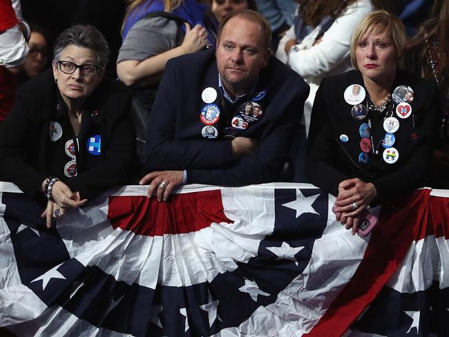 People watch the voting results at Democratic presidential nominee former Secretary of State Hillary Clinton’s election night event at the Jacob K. Javits Convention Center November 9, 2016 in New York City. Clinton is running against Republican nominee, Donald J. Trump to be the 45th President of the United States. Elsa/Getty Images/AFP == FOR NEWSPAPERS, INTERNET, TELCOS & TELEVISION USE ONLY ==