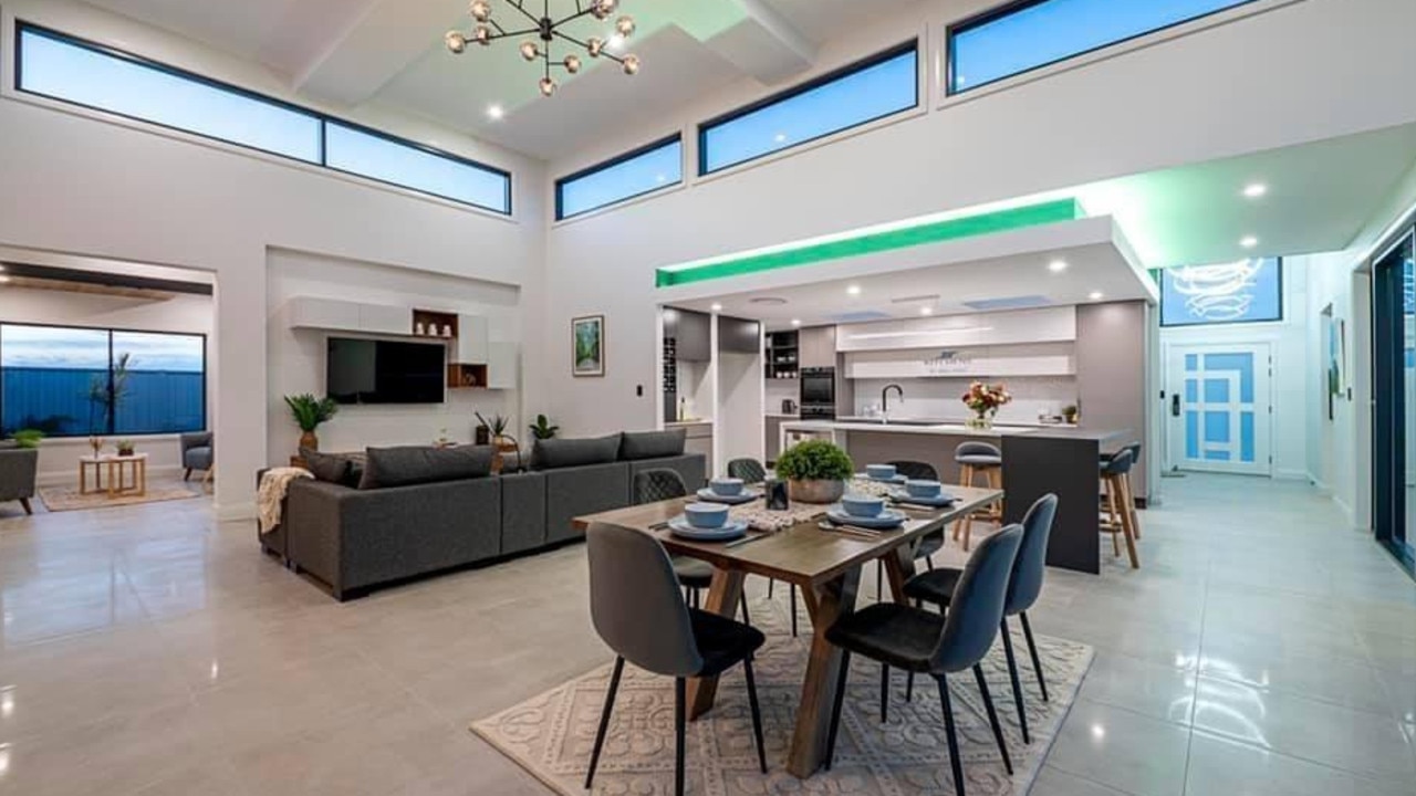 The lounge room, dining room and kitchen at the Hughes Elite Builders award-winning display home. Photo: Hughes Elite Builders