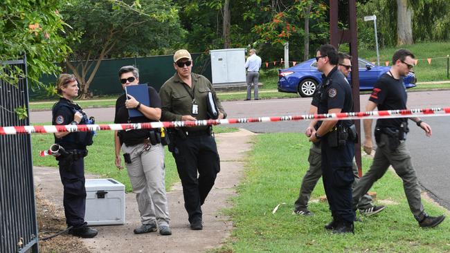 Police conduct their investigations near the scene of the incident in Jingili. Picture: Katrina Bridgeford