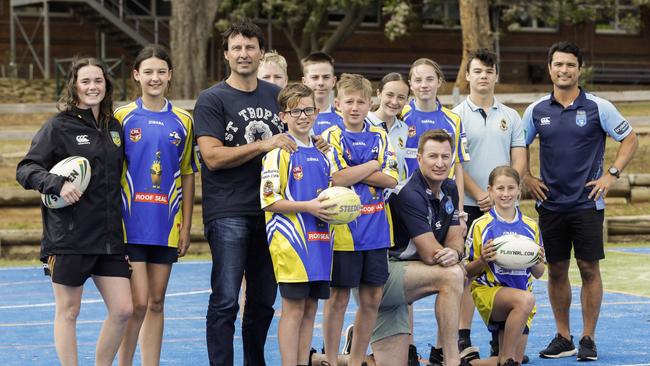 The former league stars with Junee High School students. Picture: Sean Davey